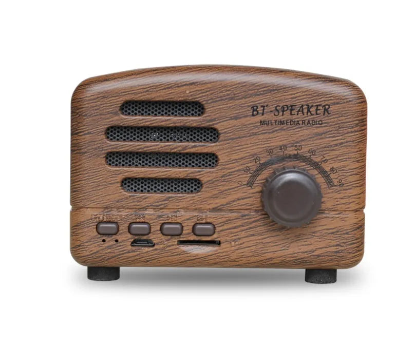 Vintage-style wooden Bluetooth speaker in wood grain finish showing front grille and compact size.