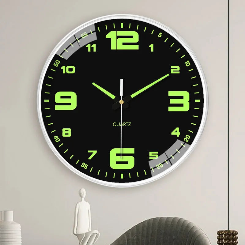 Modern 8 inch luminous wall clock in plastic case on a wall.