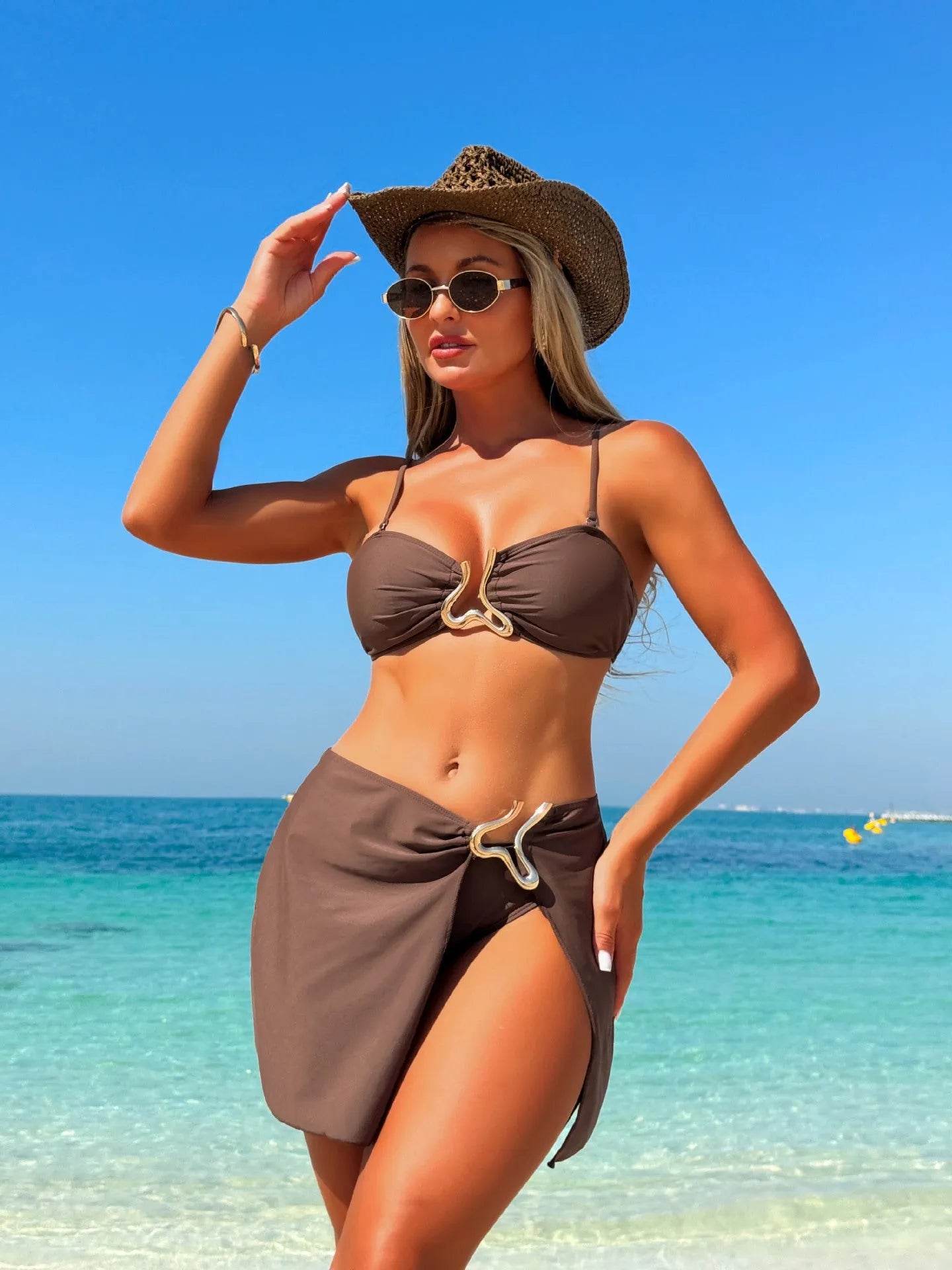 Women's three-piece solid color swimsuit set in dark brown nylon with backless design