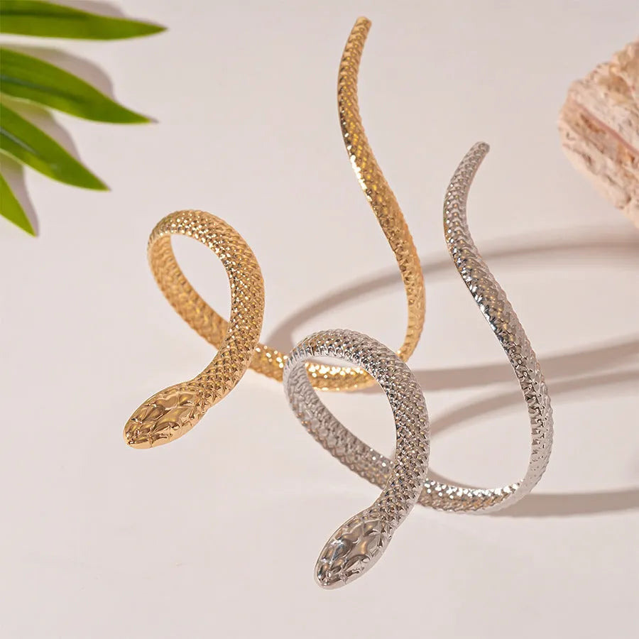 Gold and silver exaggerated twisted snake design metal ring and bracelet jewellery set