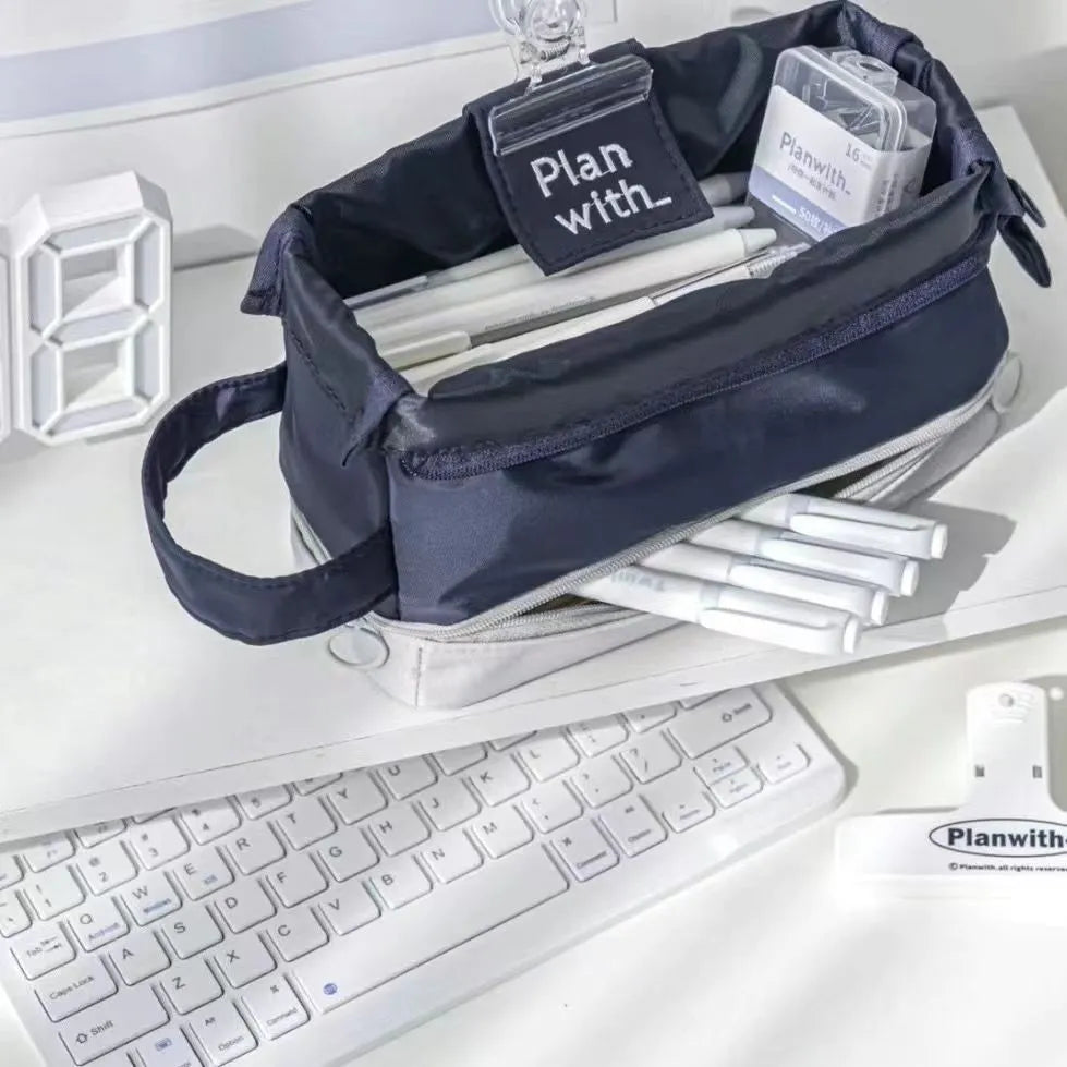 Polyester fabric pencil case with double layer folding design in dark blue, blue, and cream white colour options.