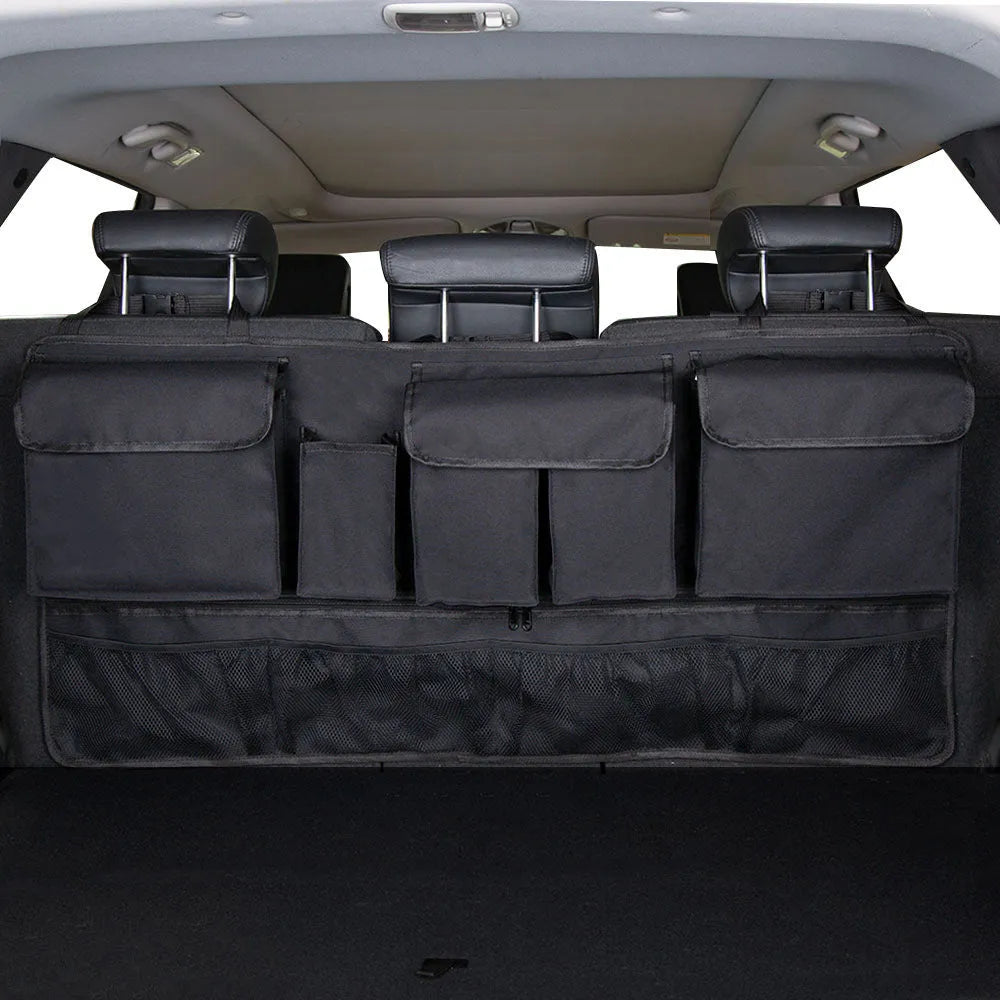 Black car boot hanging storage bag with red piping trim made from waterproof Oxford cloth with handle