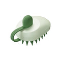 Handheld pet grooming brush for dogs with soft silicone bristles in four colour options