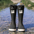 Solid colour high tube PVC rain boot in beige, shown on a white background.