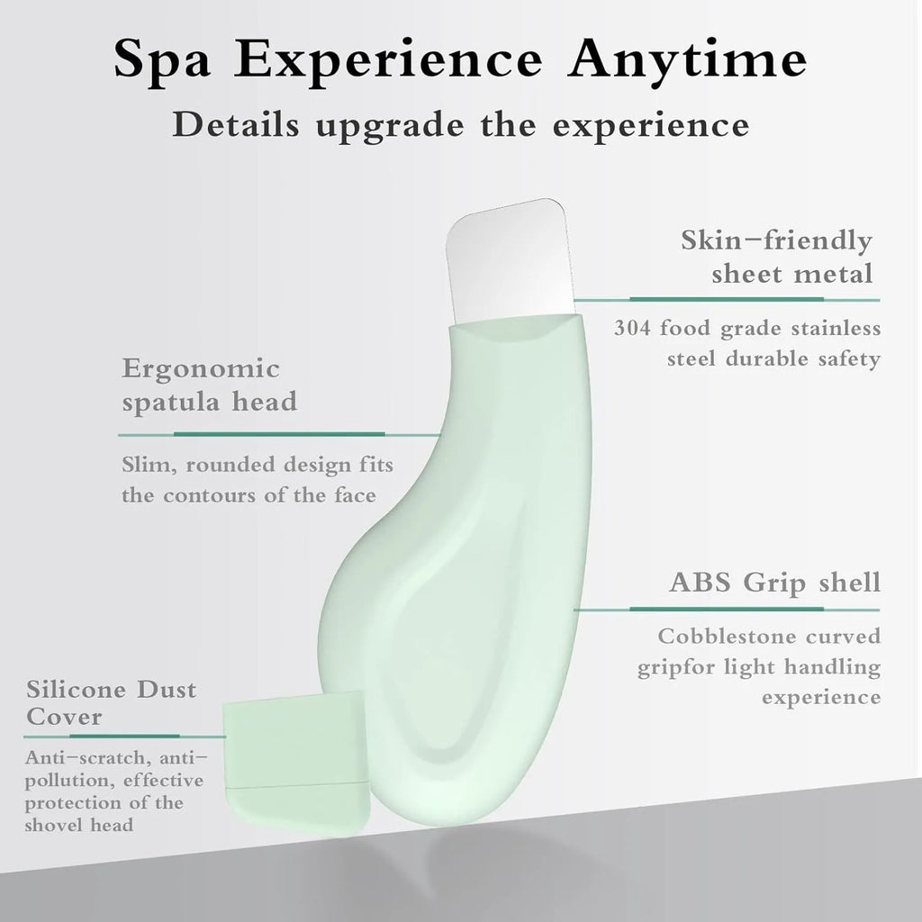 Stainless steel pore scraper face tool with a green silicone non-slip handle.