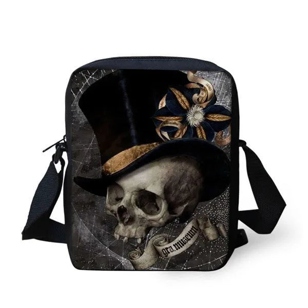 Children's medium messenger bag with skull design, showing adjustable straps and zip opening.