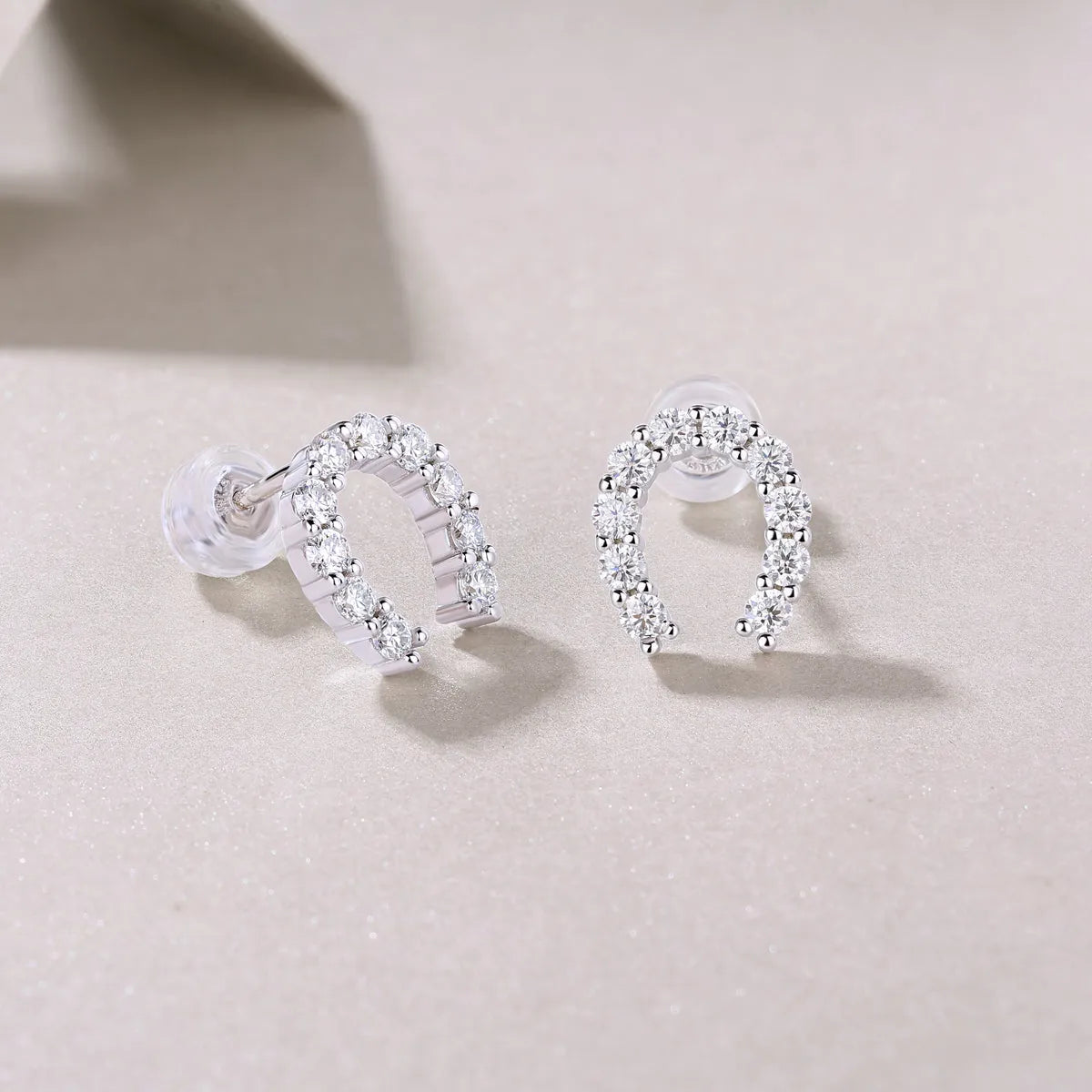 Two moissanite stud earrings on a white background, S925 silver with platinum plating, gift box included