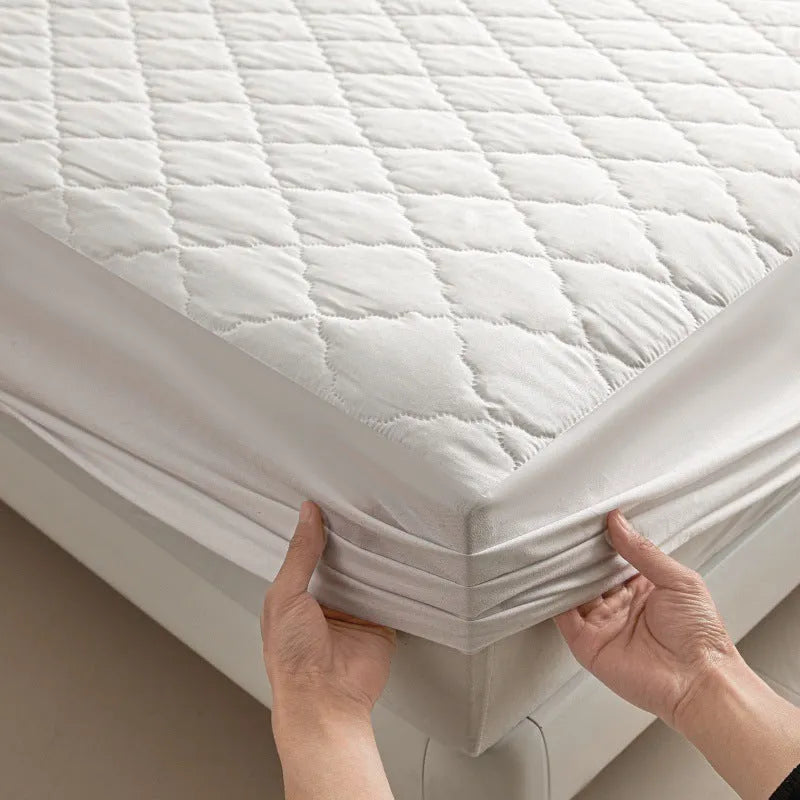 Diamond lattice quilted waterproof mattress protector set with bamboo fibre sheet and pillowcases for a 0.9m bed.