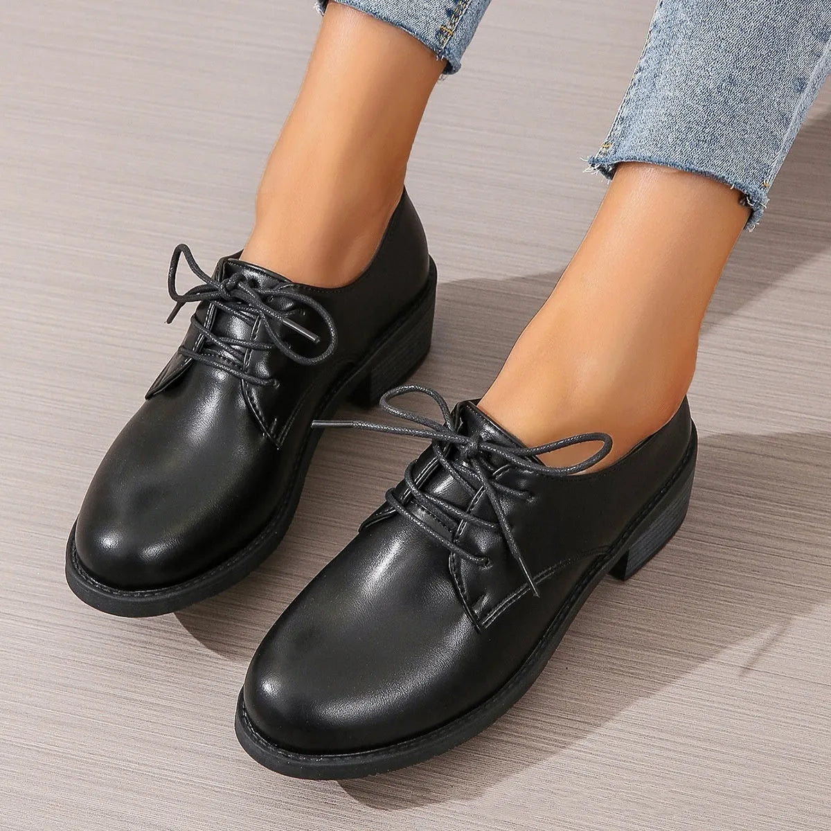 Black women's professional work shoes with thick heel and soft sole, low-top design