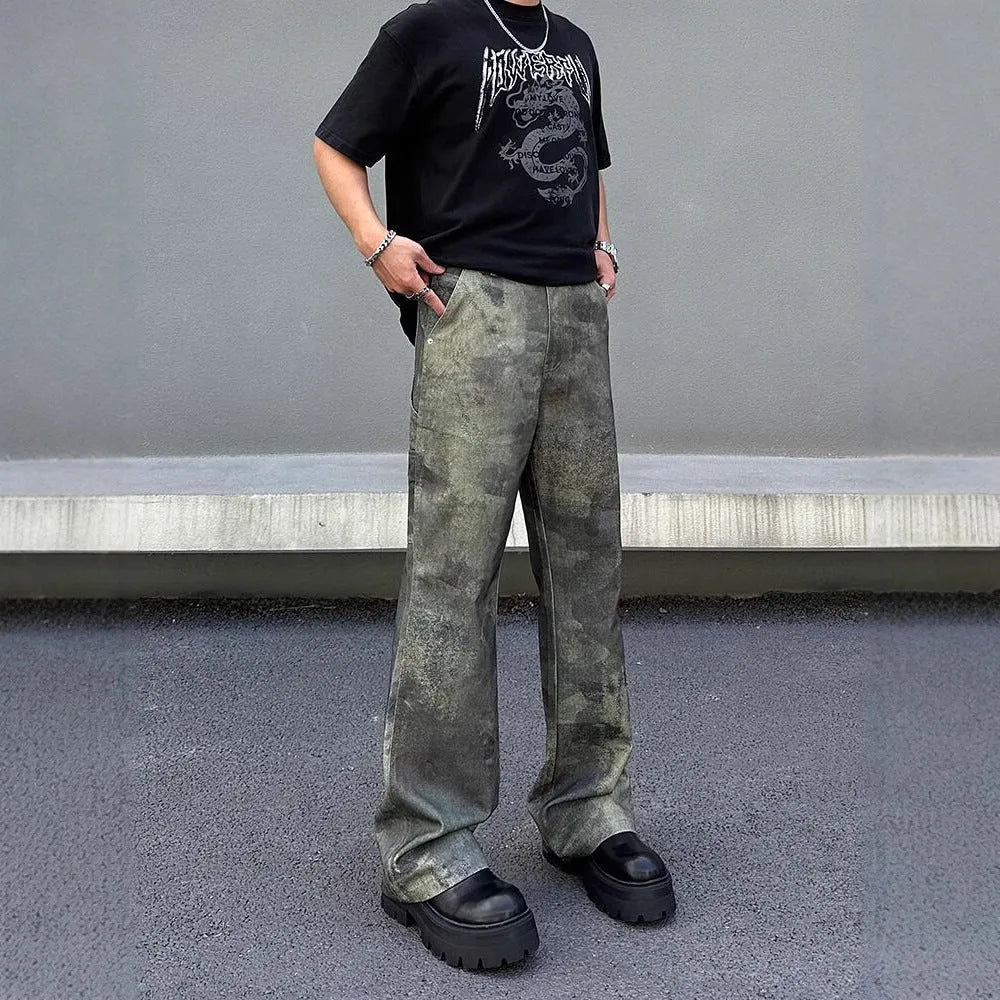 Men's straight-leg jeans with digital camouflage pattern in picture colour, showing mid-waist design and cotton denim fabric