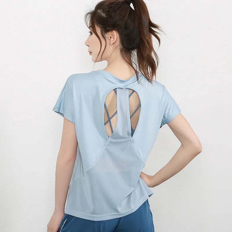 Women's short sleeve polyester sports T-shirt in pink colour for gym and running workouts