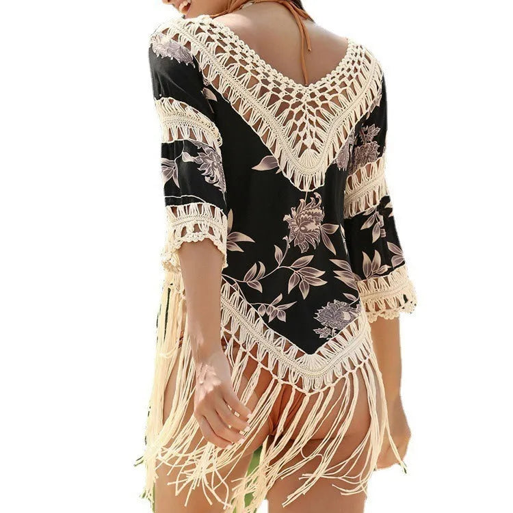 Women's apricot V-neck sun protection shirt with loose hollow-out sleeves on a hanger.