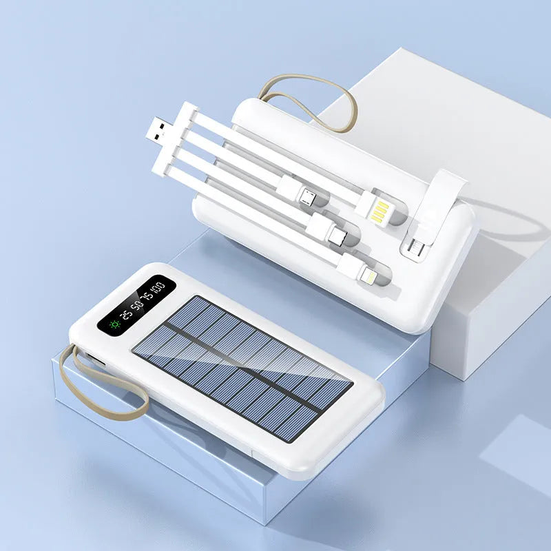 Black and white solar power bank showing size, solar panel, and USB ports for charging phones outdoors.