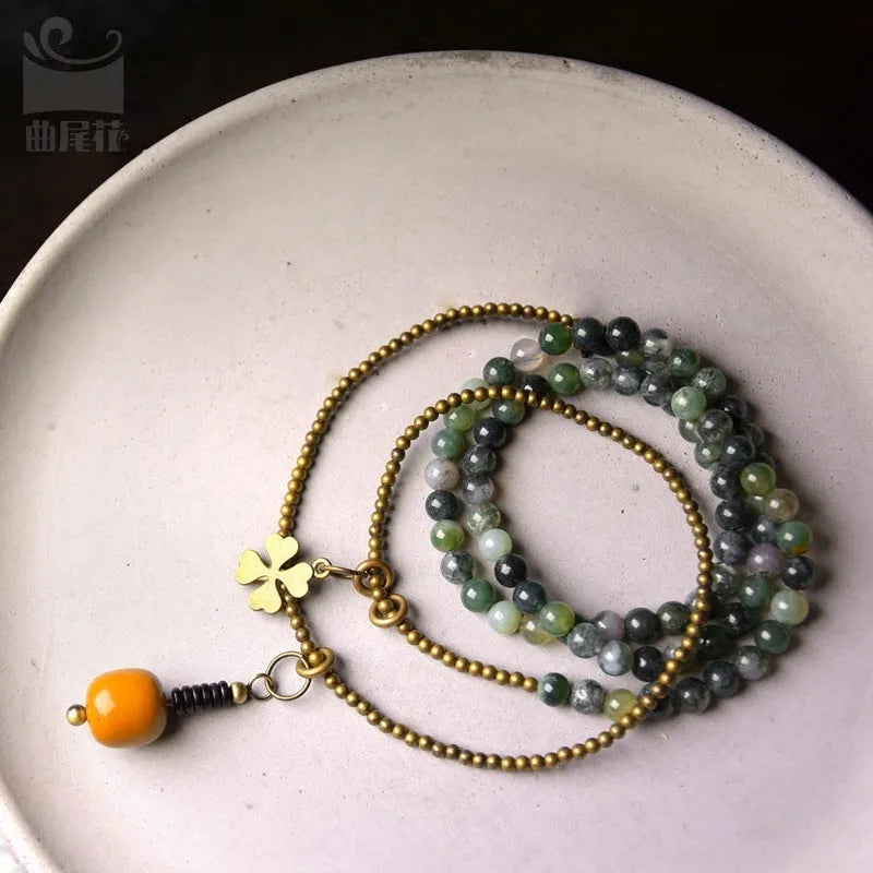 Multi-layered ethnic-style children's bracelet in natural crystal, shown in size 16 yards for girls.