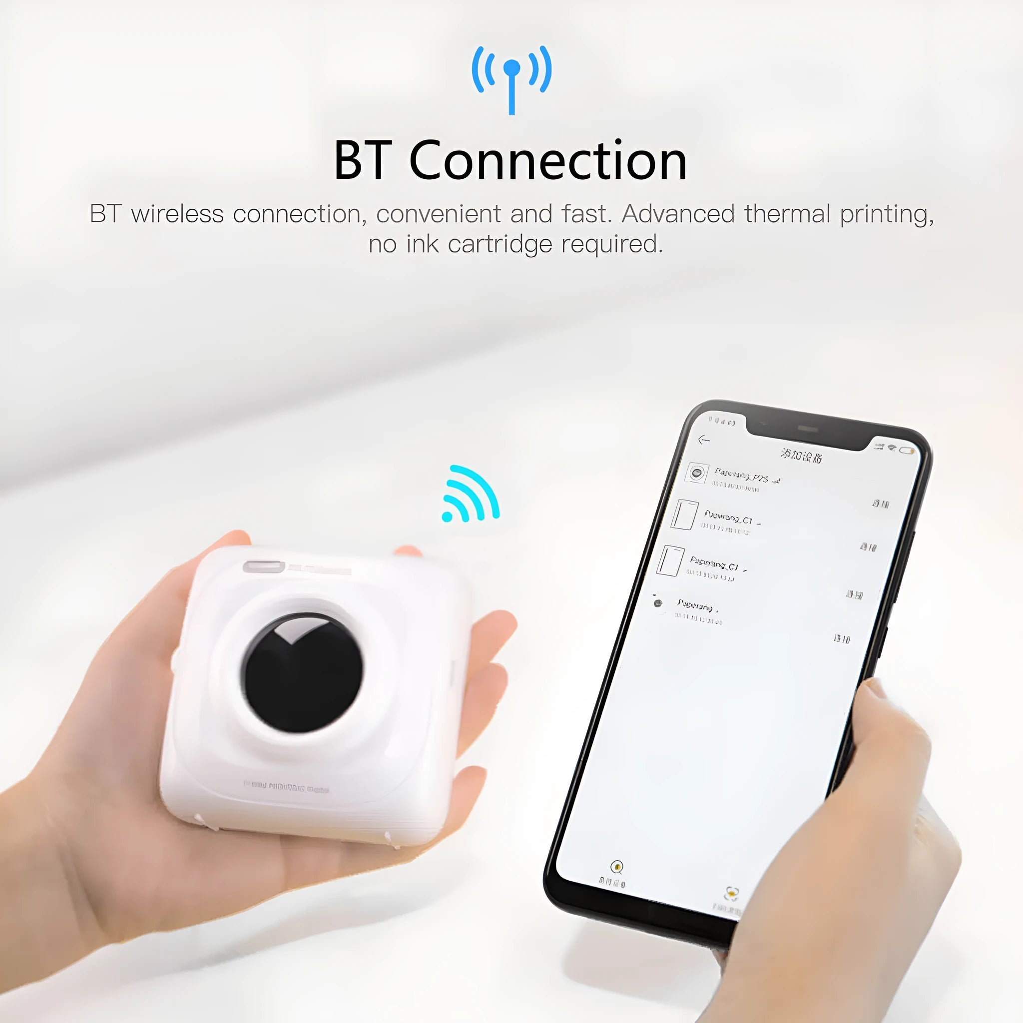 White pocket Bluetooth thermal label printer on desk with smartphone app interface visible