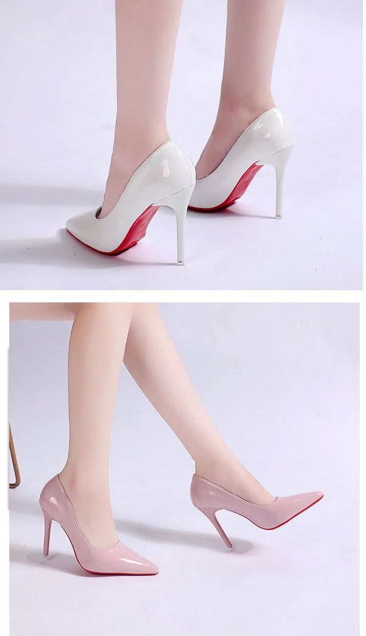 Women's black stiletto heel pump with pointed toe and shallow mouth cut on a white background.