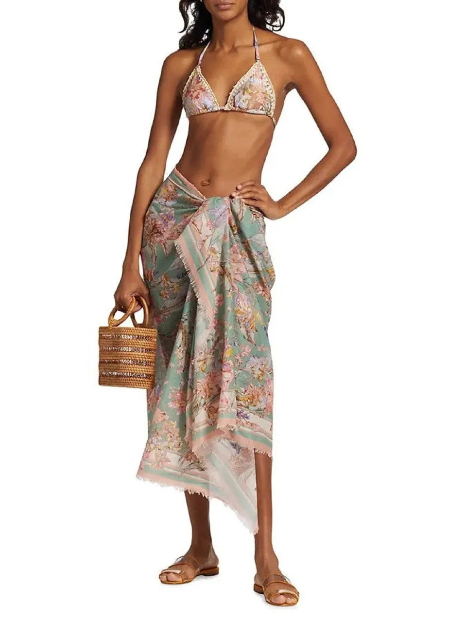 Women's creamy-white floral bikini suit with skirt for beach vacations