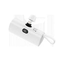 Small capsule-shaped wireless power bank with digital display and folding plug in five colour options.