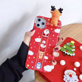 Christmas-themed silicone back cover case for iPhone on a red background.