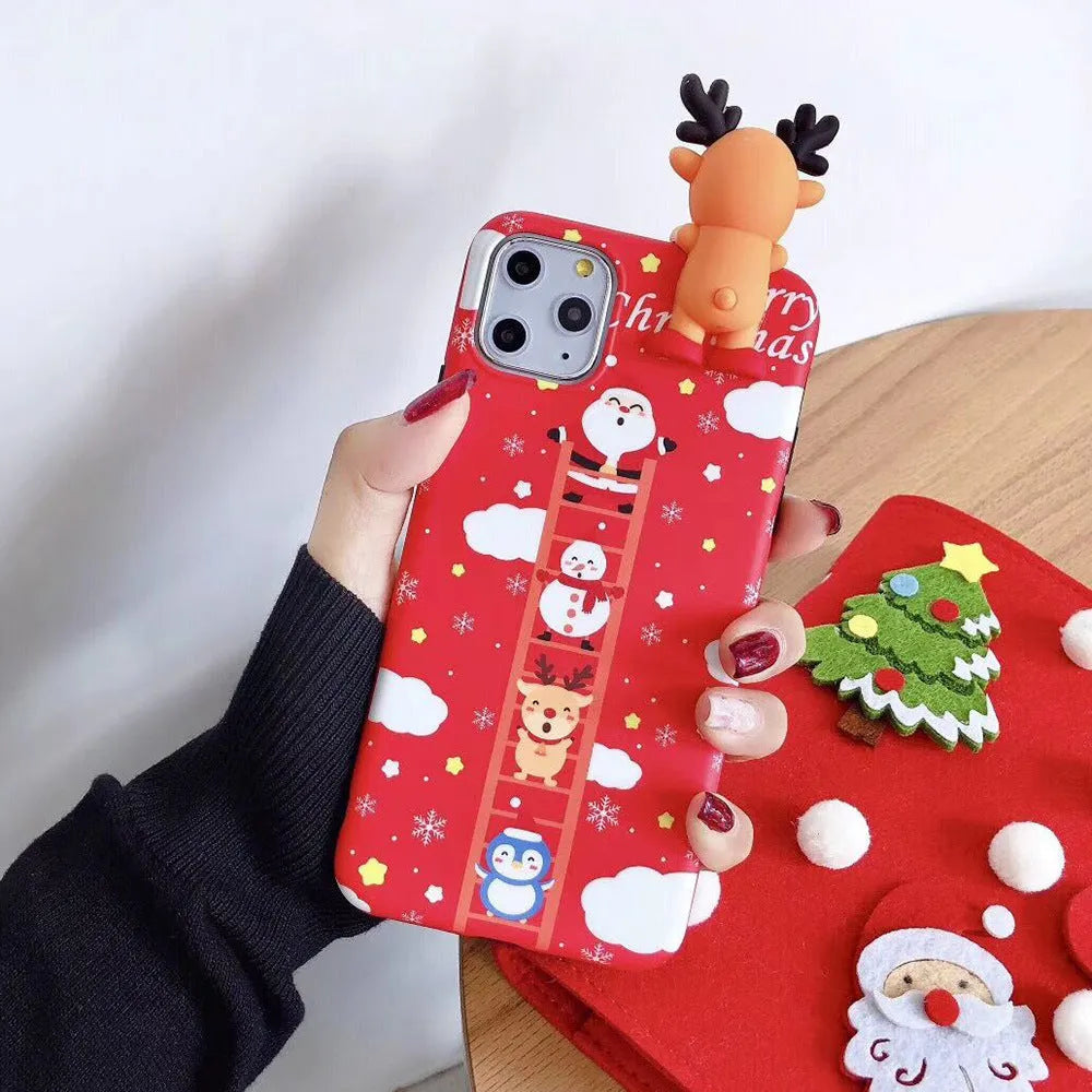 Christmas-themed silicone back cover case for iPhone on a red background.