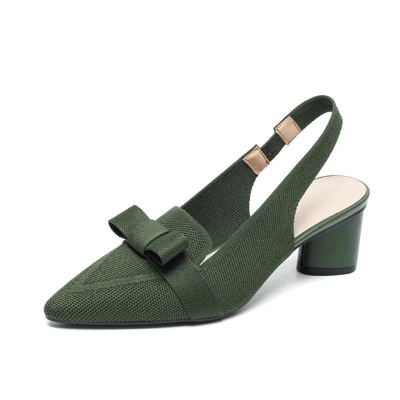 Women's closed toe high heel sandal with back ankle strap in a solid colour, showing pointed toe and fabric upper.