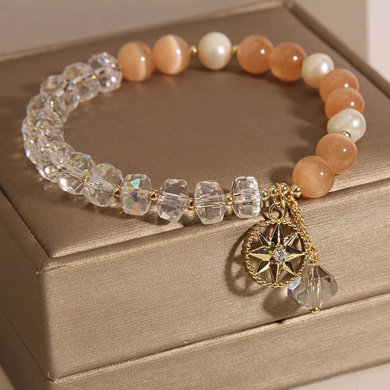 Gold-plated women's bracelet with orange crystal eight Awn star design