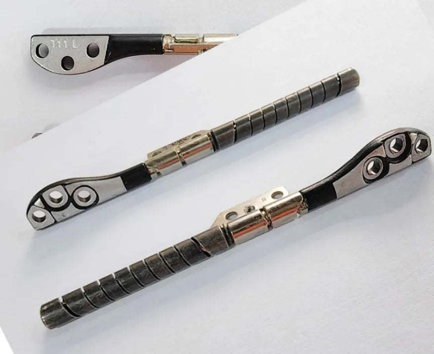 Pair of A1286 replacement screen spindles for MacBook Pro 15-inch laptop repair.