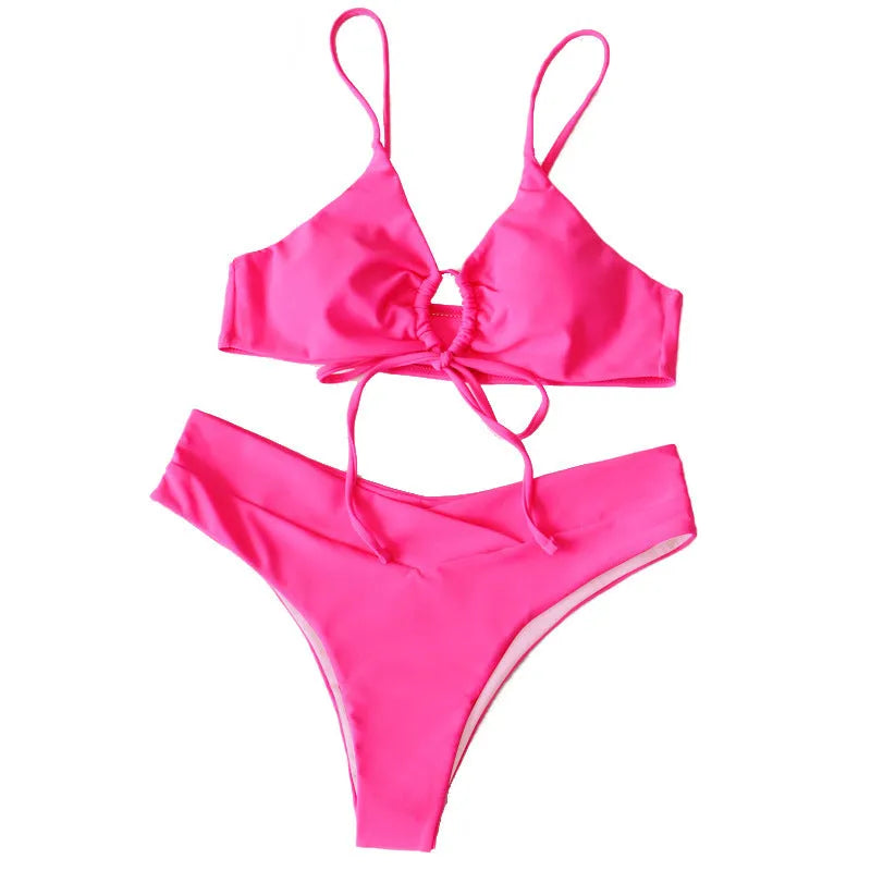 Women's orange tied bow split front bikini with briefs bottoms, shown on a mannequin.