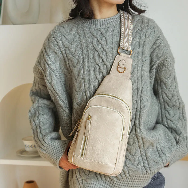 Soft brown PU women's crossbody messenger bag with an open front pocket and visible stitching.