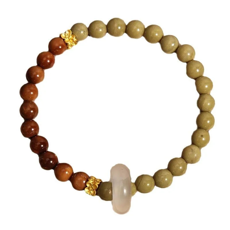 Green gradient women's bracelet with crown and geometric shapes in a Chinese style design
