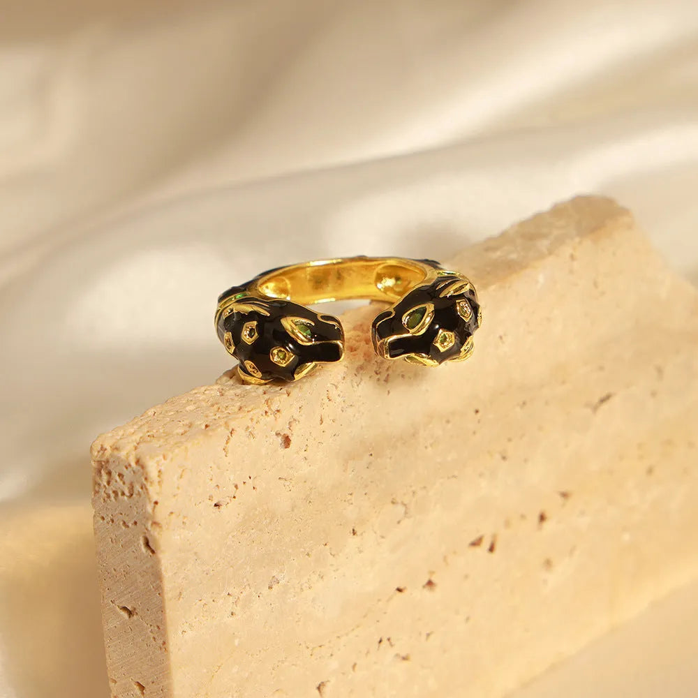 Women's black cheetah open geometric ring made from copper in size 7.