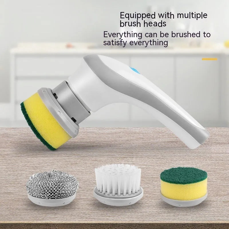 White handheld electric cleaning brush with rotating brush head on bathroom tiles
