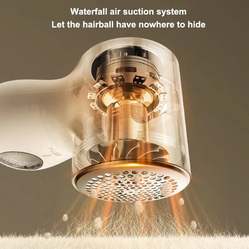 White electric lint remover with LED display and USB charging port on a fabric surface.