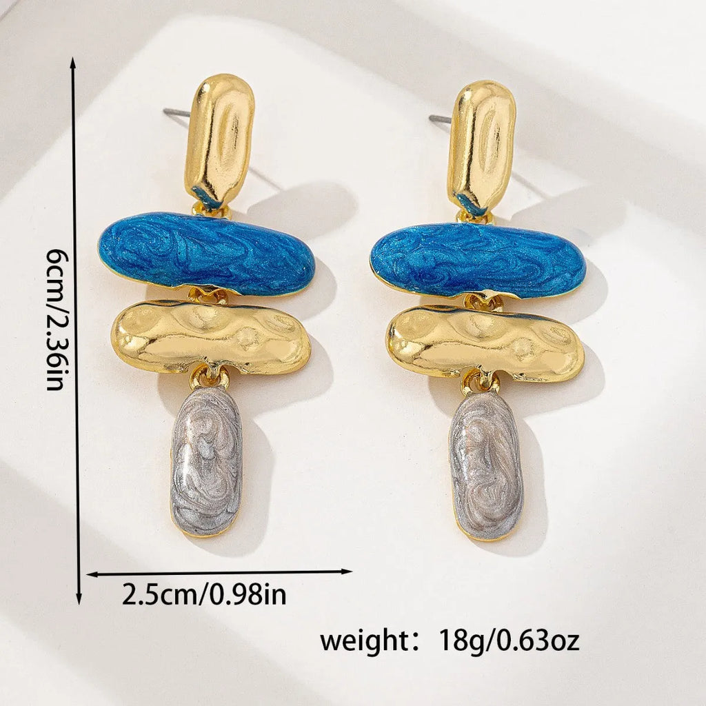 A pair of women's geometric stud earrings with a multicolour electroplated finish on zinc alloy.