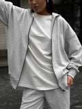Street style long-sleeved coat and trousers two-piece set in loose fit with solid colour design