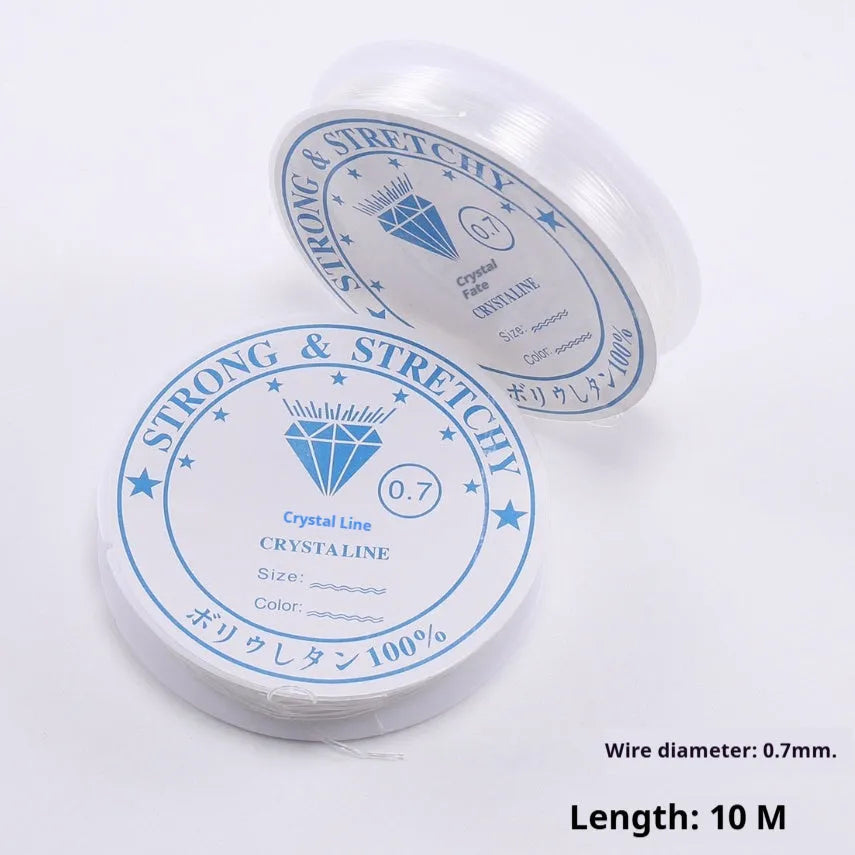 Reel of transparent white elastic fishing line for beading and DIY jewellery making.