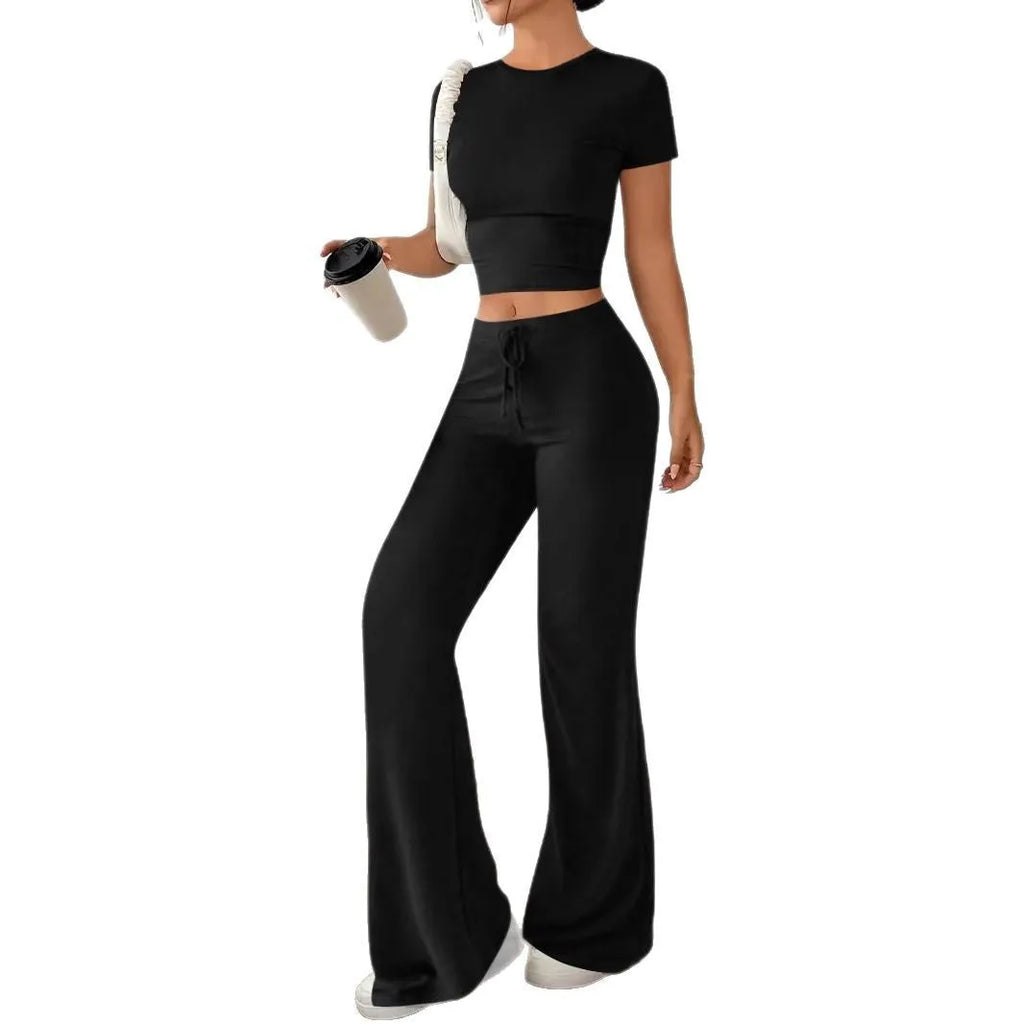 Black high waist trousers and regular sleeve T-shirt co-ordinated suit set.