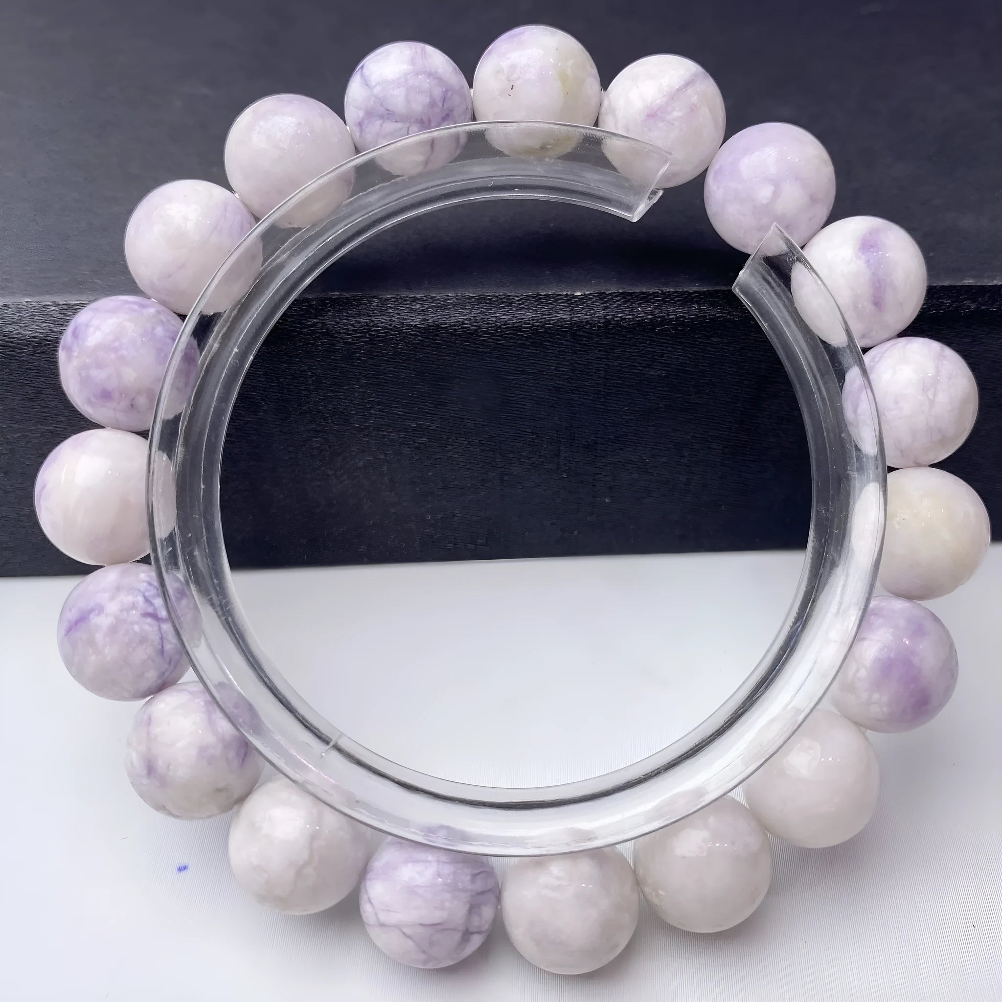 Women's natural purple turquoise bracelet showing different bead size options.