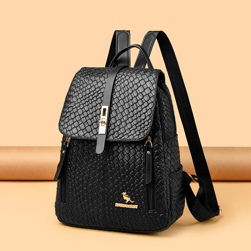 Women's large capacity waterproof PU backpack in black, medium hardness, for travel and work