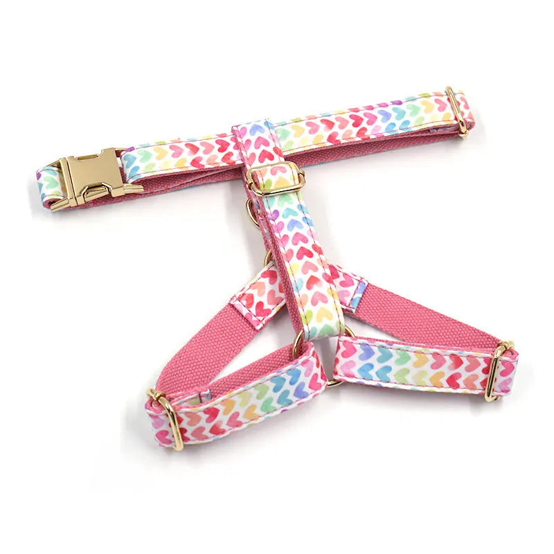 Pink colourful heart stone dog harness with gold buckle on a polyester chest and back strap.