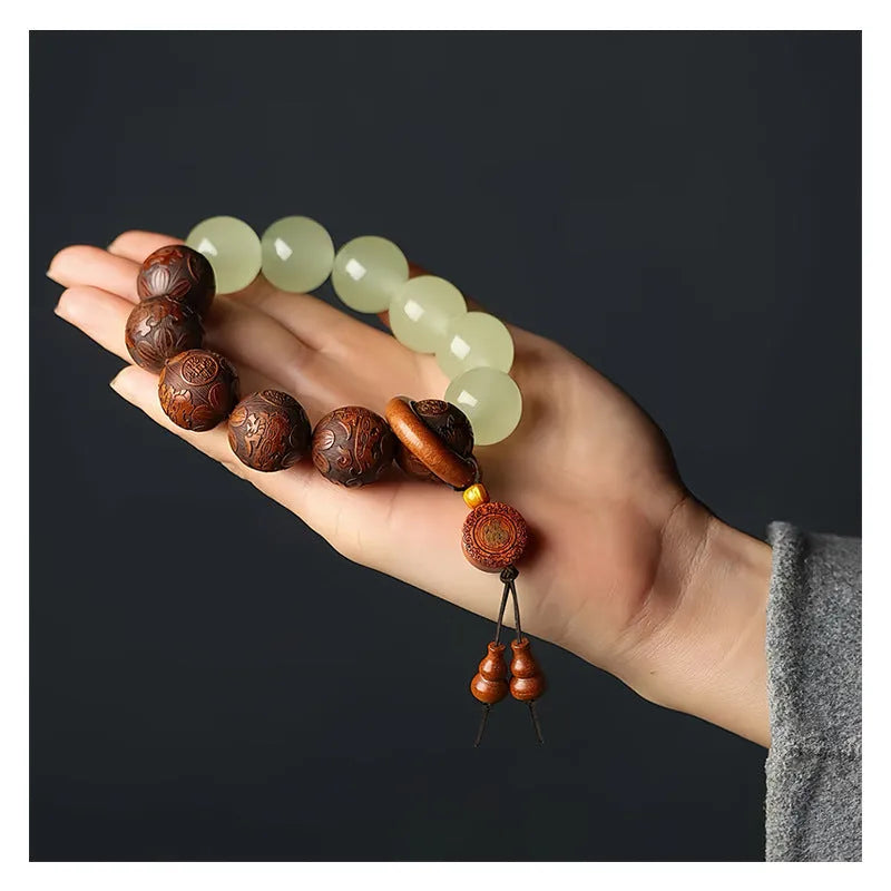 Rosewood bracelet with amass fortunes fu character carving and 20mm wooden beads
