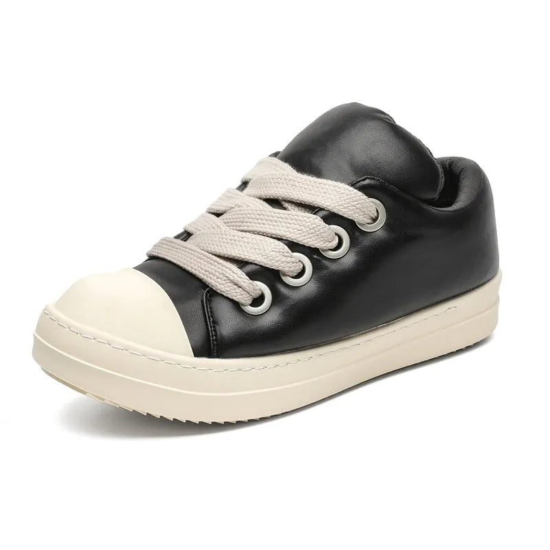 Men's black leather slip-on casual shoes with flat rubber sole and round toe.