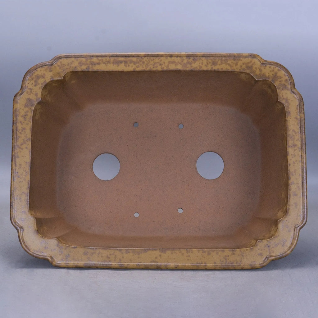Modern rectangular purple sand floor planter with a visible water level gauge on its side.