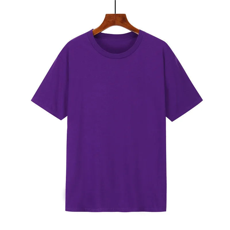 A man's loose-fitting black cotton T-shirt with short sleeves, laid flat.