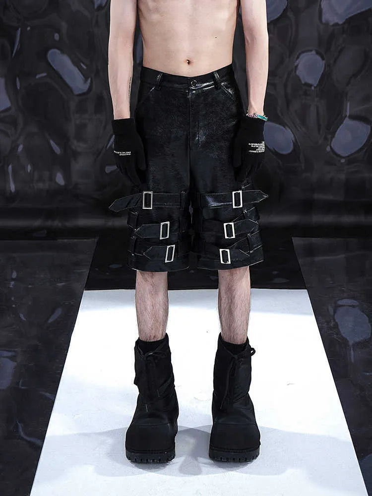 Men's black PU leather cropped pants with distinctive ring detailing and stretch fabric