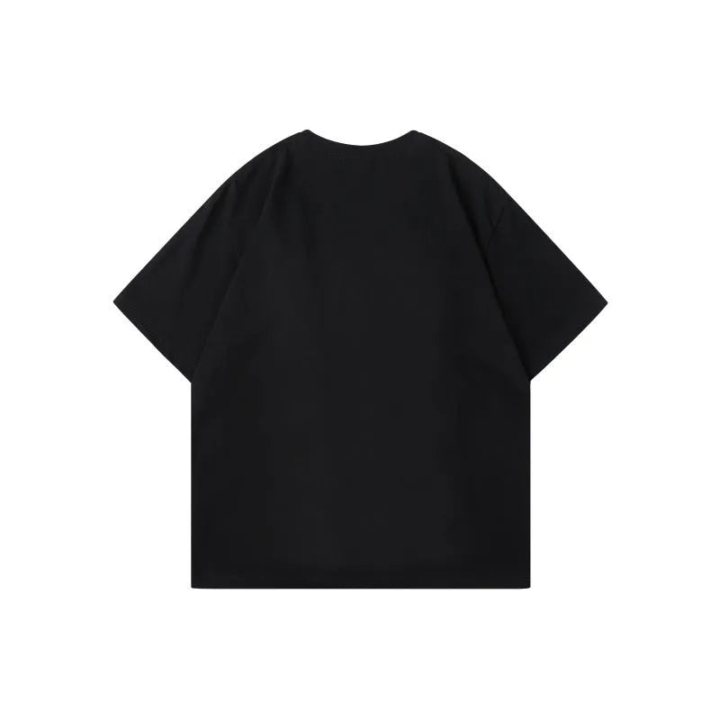 Cotton pullover top with colour contrast patchwork design showing letter patterns, loose fit with short sleeves