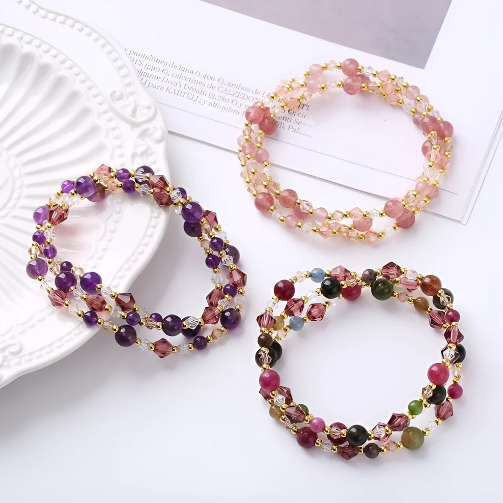 Women's three-ring bracelet with tourmaline, strawberry quartz and amethyst gemstones on adjustable cord