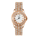 Women's quartz watch with diamond accents, round 26mm dial, alloy case, gold finish