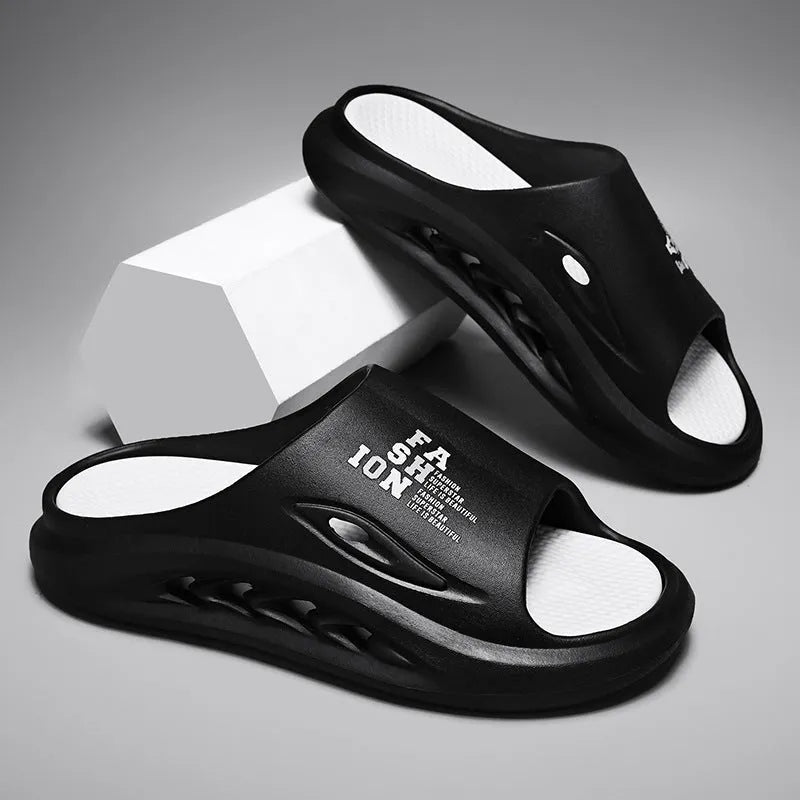 Men's white and green colour-blocked EVA sports slippers with a thick, textured sole on a plain background.