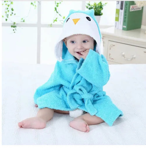 Children's hooded cotton animal-shaped bathrobe in pink with hood and front pocket, soft treatment finish.